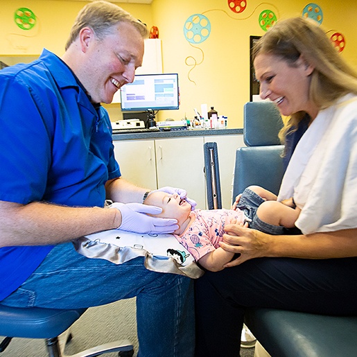 Toddler receiving dental exam