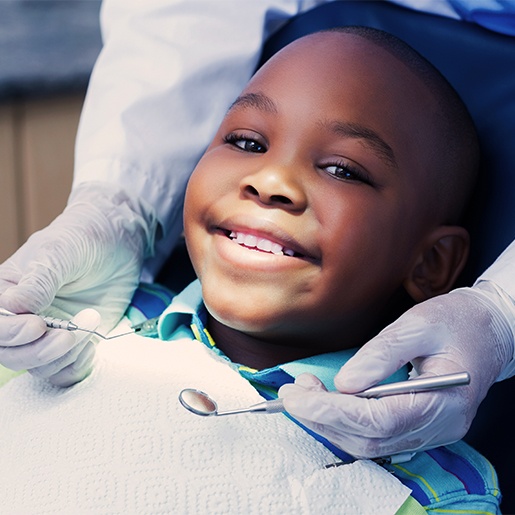 Smiling child in dental chair