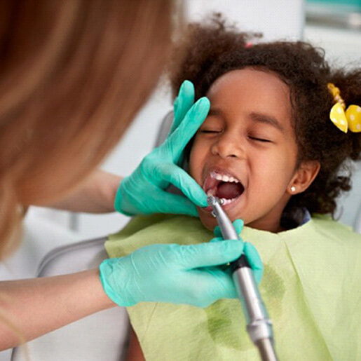 Child receives dental treatment