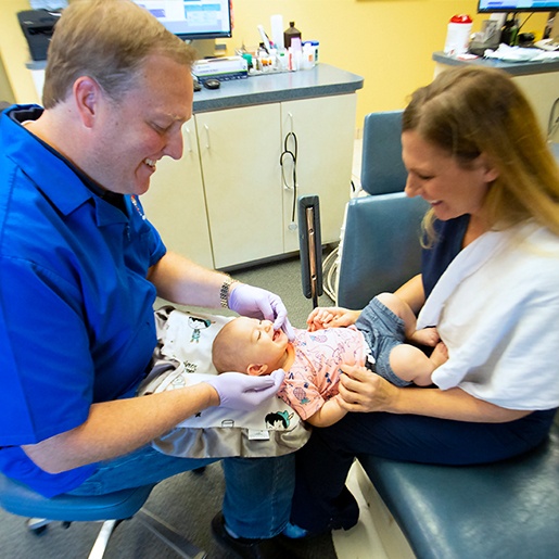 Dr. Stroud performing toddler dental exam