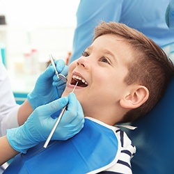 a child patient getting dental care in Willow Park