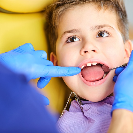 Young child receiving dental exam
