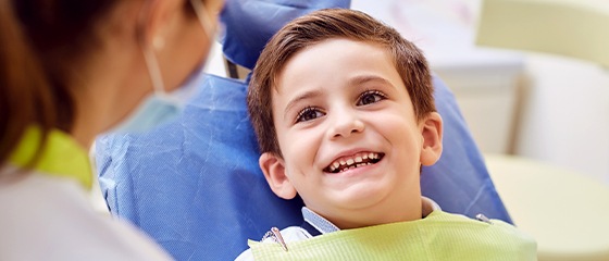 Smiling child in dental chair