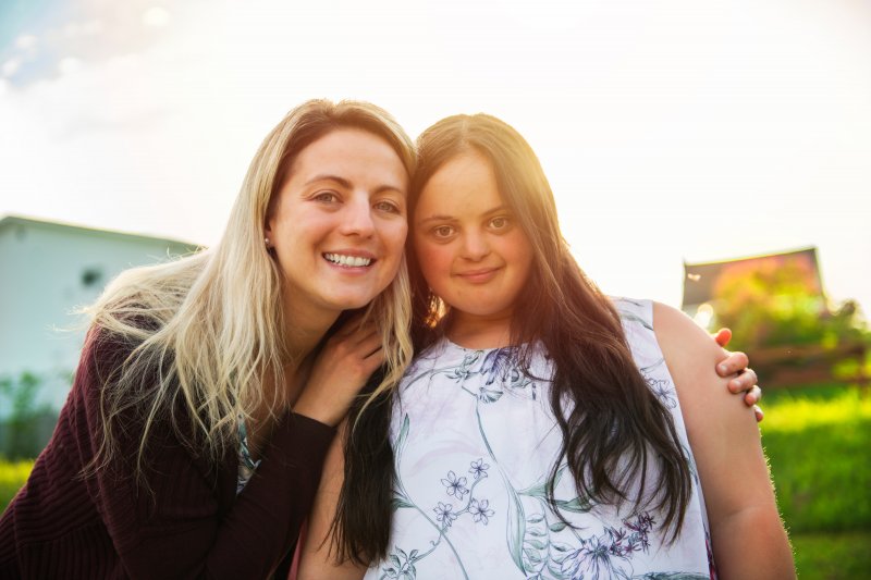 woman smiling with child