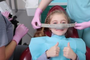 a child receiving nitrous oxide dental sedation