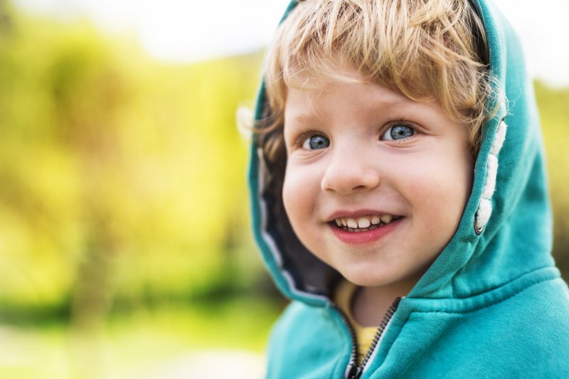 A toddler outside in nature 